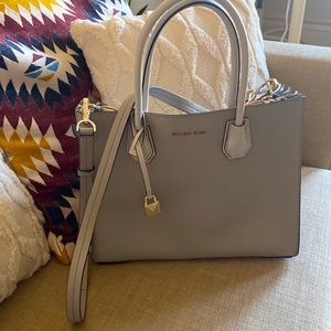 Micheal Kors stone colored handbag with lock keychain, brand new never used